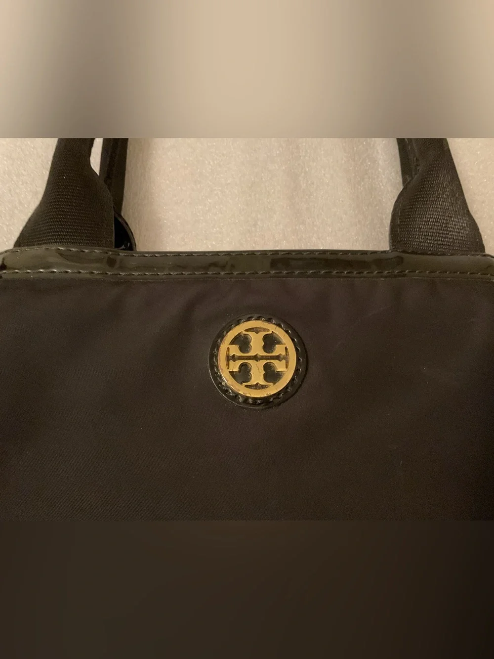 Tory Burch unlike softer colored